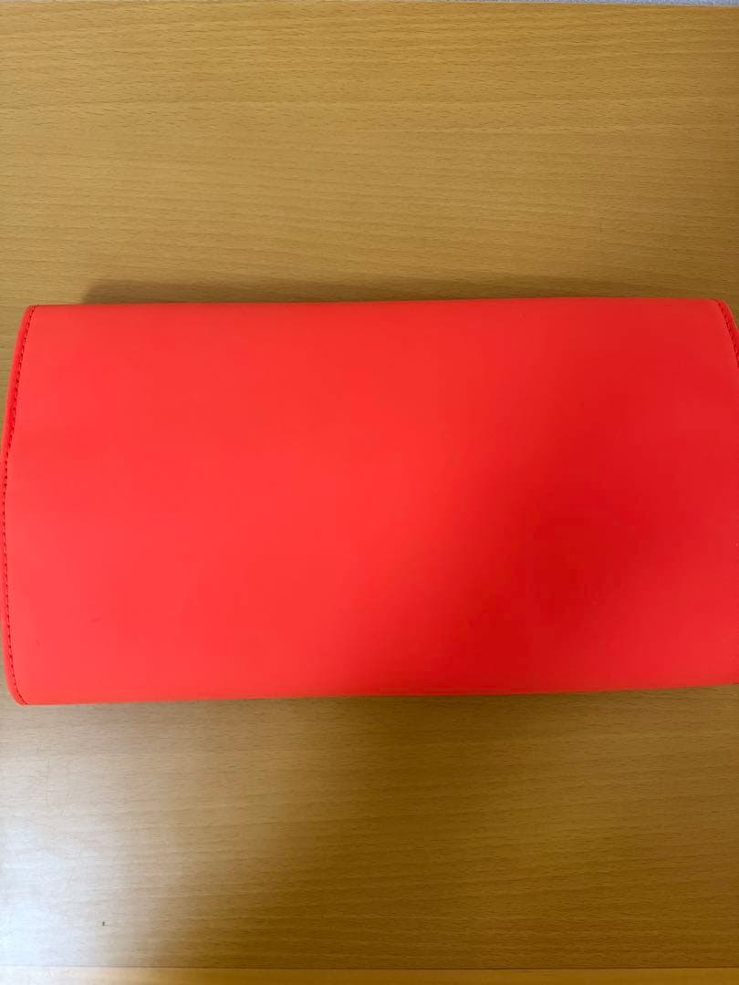 TUMI トゥミ トラベルポーチ オレンジ ケーブル収納 旅行 出張